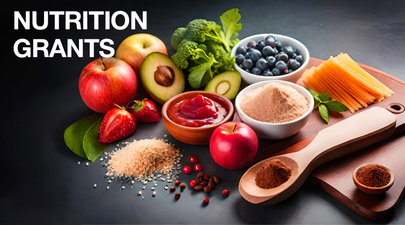 Fruits, vegetables, and grains on a cutting board.